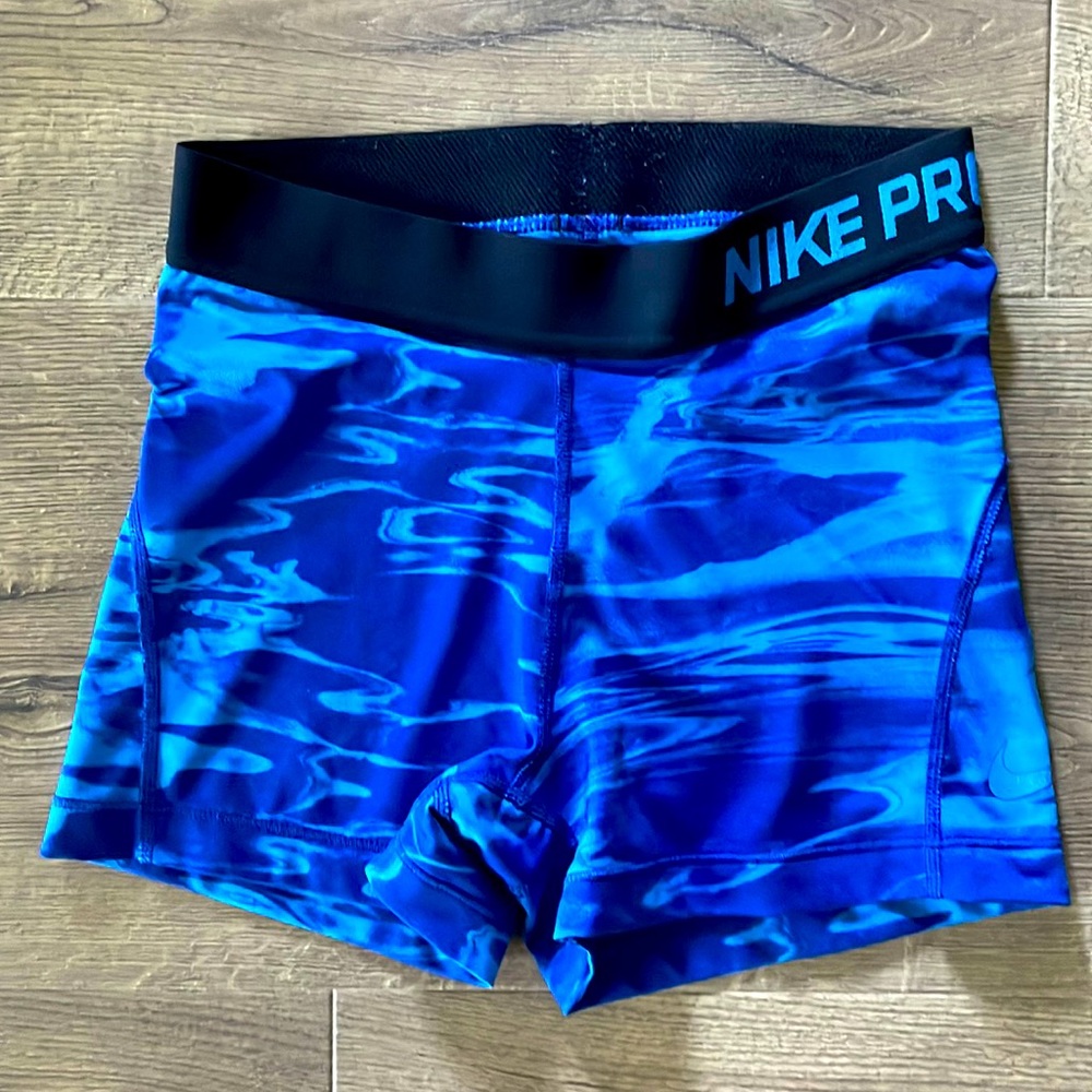 Blue Nike Pro shorts